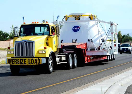 Image of NASA's next generation of a manned-spacecraft enroute to White Sands Missile Range as an oversized load.