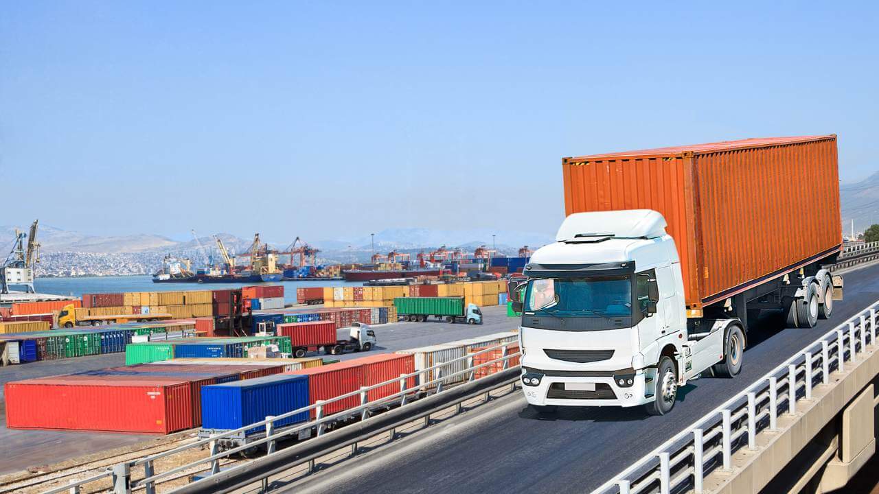 An example of intermodal freight and what it means is shown in the image. There are hundreds of bright shipping containers with a big truck transporting one of the freight containers away to it's destination.